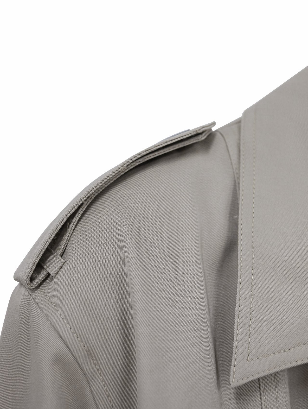 Detailed view of the shoulder epaulette and collar stitching, highlighting construction and fabric quality.