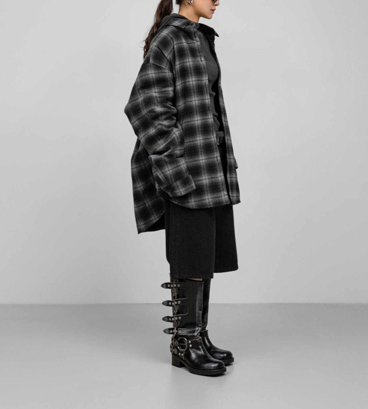 Side profile of the Structured Quilted Check Overshirt showing dropped shoulders and relaxed drape.
