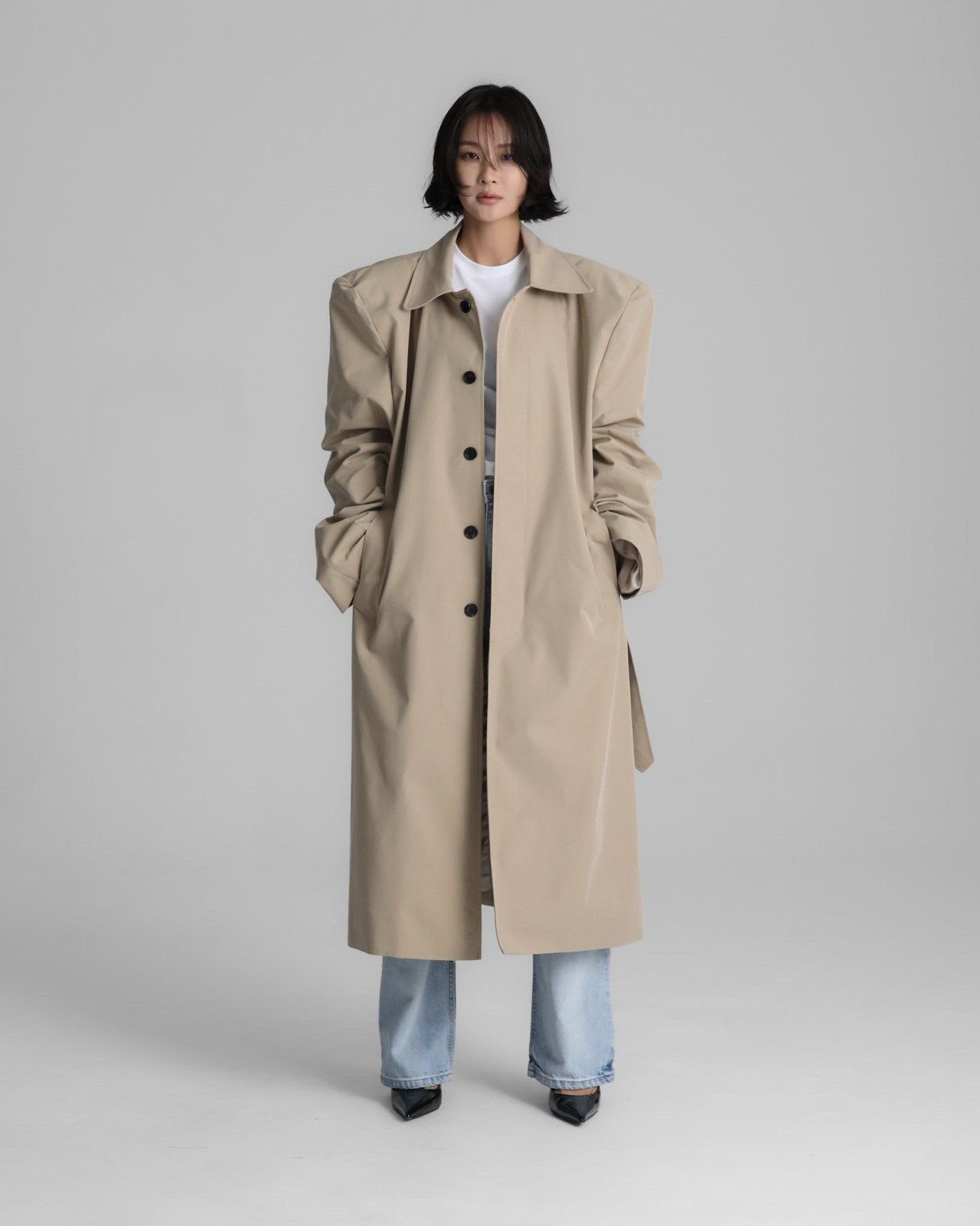 Full front view of the Classic Oversized Structured Trench Coat worn open over denim, showing oversized fit.