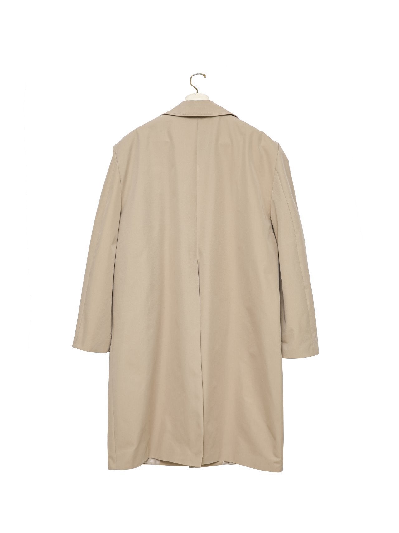 Classic Oversized Structured Trench Coat on hanger, displaying back view of crisp cotton-blend texture and design form.