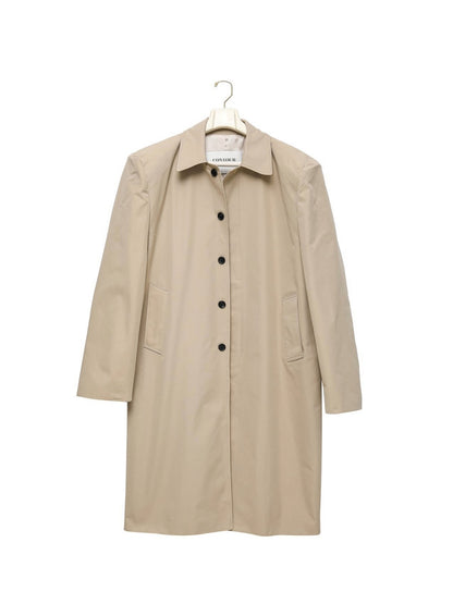 Classic Oversized Structured Trench Coat on hanger, displaying crisp cotton-blend texture and design form.