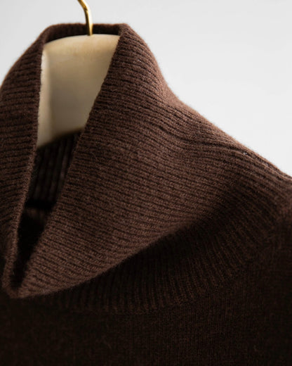 Ribbed high neck detail of the cashmere-blend wool knit – sculpted and refined finish