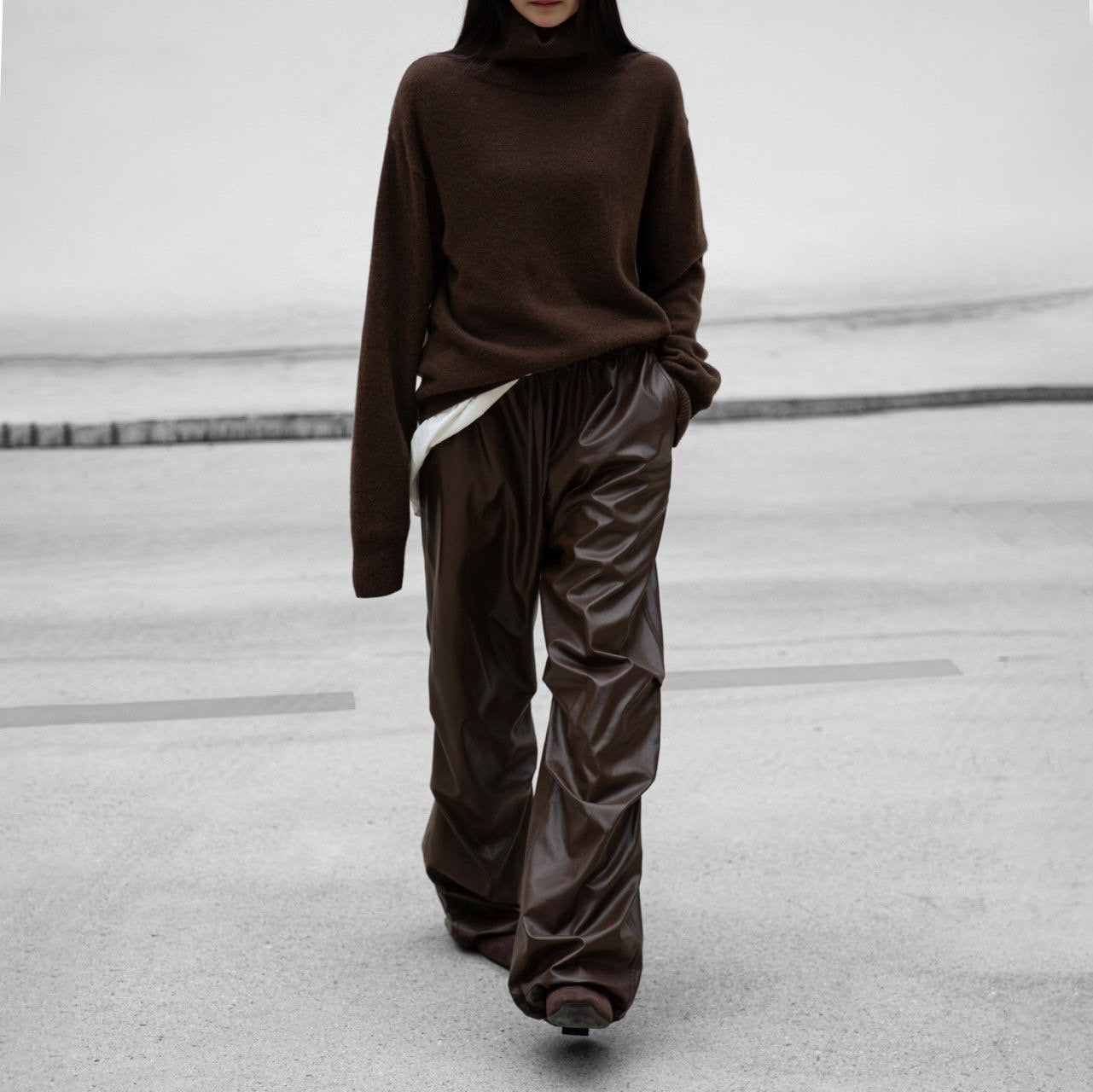 Street-style look featuring chocolate brown cashmere wool knit paired with wide-leg pants – CONTOUR New York